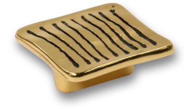 Griff Hofgeismar Druckguss gold - 54 mm lang vor weißem Hintergrund