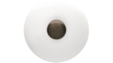 Knopf Nauen Keramik-Druckguss/Metallfuß weiß brüniert - 35 mm lang  vor weißem Hintergrund
