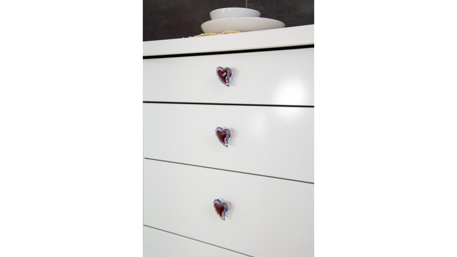 Knopf Schleiden Kunststoff blau-rot transparent - 43 mm lang  vor weißem Hintergrund