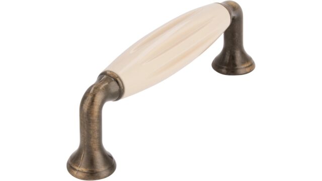 Griff + Einlage Wörth Druckguss - Kunststoff altmessing brüniert gebürstet beige - 114 mm lang vor weißem Hintergrund