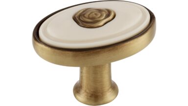 Knopf Brakel Druckguss - Kunststoff altmessing brüniert gebürstet beige - 32 mm lang vor weißem Hintergrund