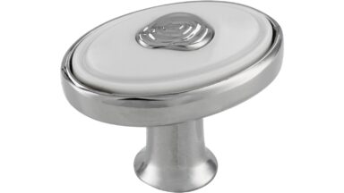 Knopf Brakel Druckguss - Kunststoff chrom glänzend weiß - 32 mm lang vor weißem Hintergrund