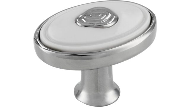 Knopf Brakel Druckguss - Kunststoff chrom glänzend weiß - 32 mm lang vor weißem Hintergrund