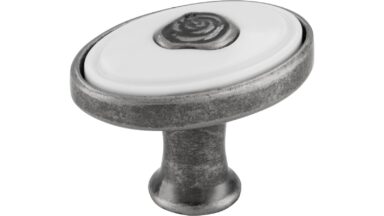 Knopf Brakel Druckguss - Kunststoff altsilberfarbig weiß - 32 mm lang vor weißem Hintergrund