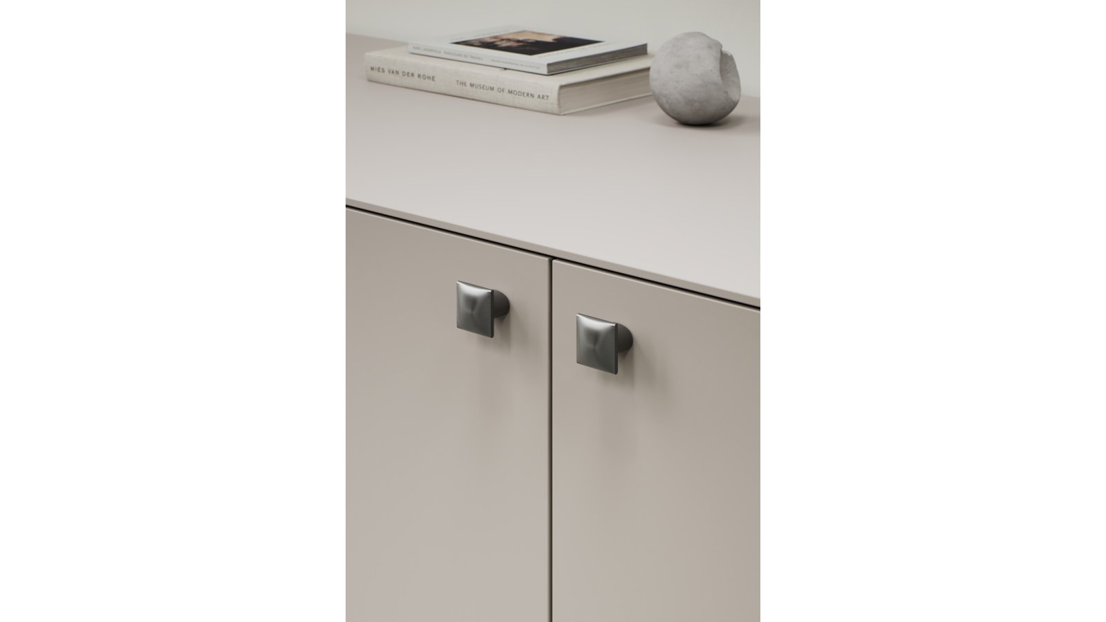 Griff FLOW-KNOB Zink - Gun-metal - 30 mm lang  vor weißem Hintergrund