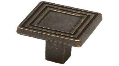 Knopf Biblis Metall - patiniertes Messing - 30 mm lang vor weißem Hintergrund