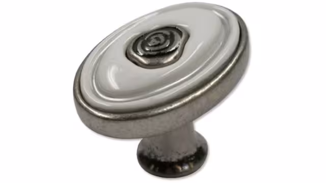 Knopf Brakel Druckguss - Kunststoff altsilberfarbig weiß silber glänzend - 32 mm lang vor weißem Hintergrund